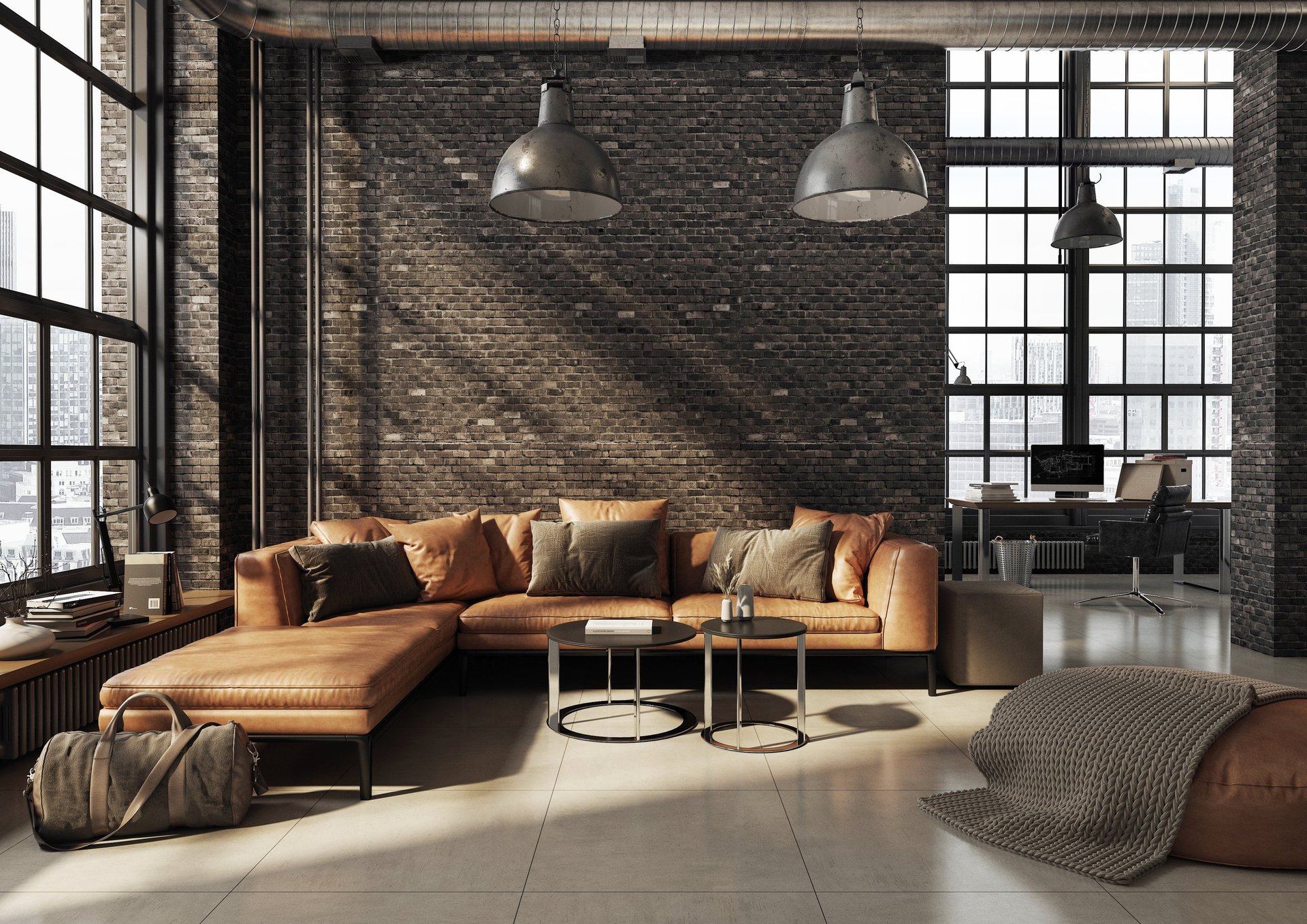 Industrial loft interior with brick walls and large windows